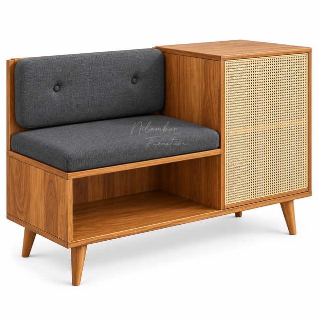 Mid-century modern wooden bench with a dark gray upholstered seat and backrest, featuring a cane panel side cabinet and open lower shelf, shown on a white background.